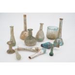 A quantity of Classical antique glass vessels, tallest 16 cm, smallest 5 cm