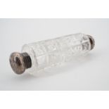 A Victorian silver and cut glass double ended scent bottle, with threaded pommels, one engraved with