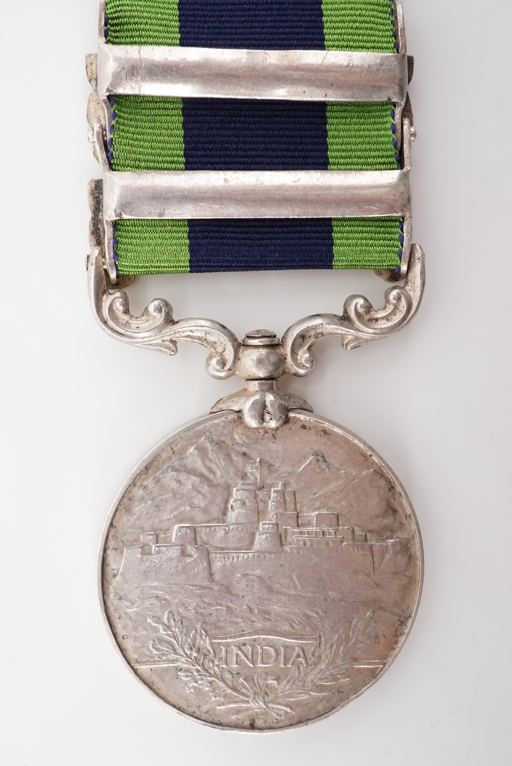 A George V India Service medal with Afghanistan NWF 1919 and Waziristan 1921-24 clasps to 404 - Image 2 of 3