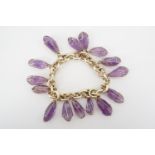 A contemporary high carat yellow metal and amethyst bracelet, having a belcher-link chain supporting