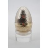 Stuart Devlin An Elizabeth II silver-gilt novelty 'Surprise Egg' "Floral Festival", planished and