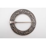 An Alexander Ritchie Iona Scottish silver penannular type brooch, cast with running foliate