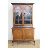 A late 19th / early 20th Century inlaid mahogany bookcase cabinet, 192 cm high