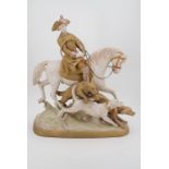 A Royal Dux porcelain figurine of a mounted huntsman clutching a horn and the reigns of his horse,