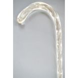 A Victorian hollow clear glass spirally fluted walking cane, 93 cm