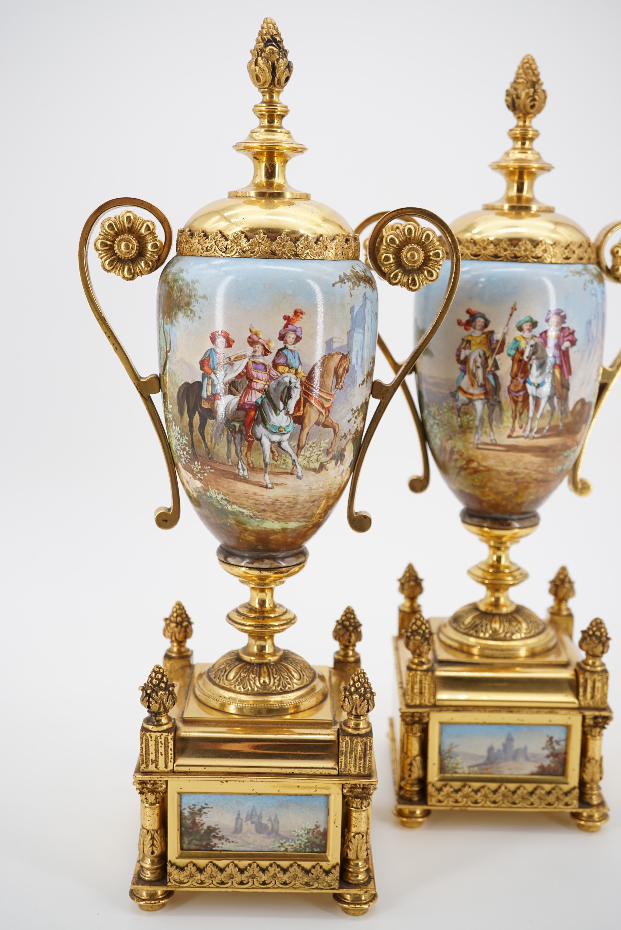 A pair of late 19th Century gilt metal mounted ceramic garniture urns, each oviform, with domed faux - Image 2 of 3