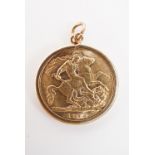 A George V gold half sovereign in a 9ct gold pendant mount, 4.7g