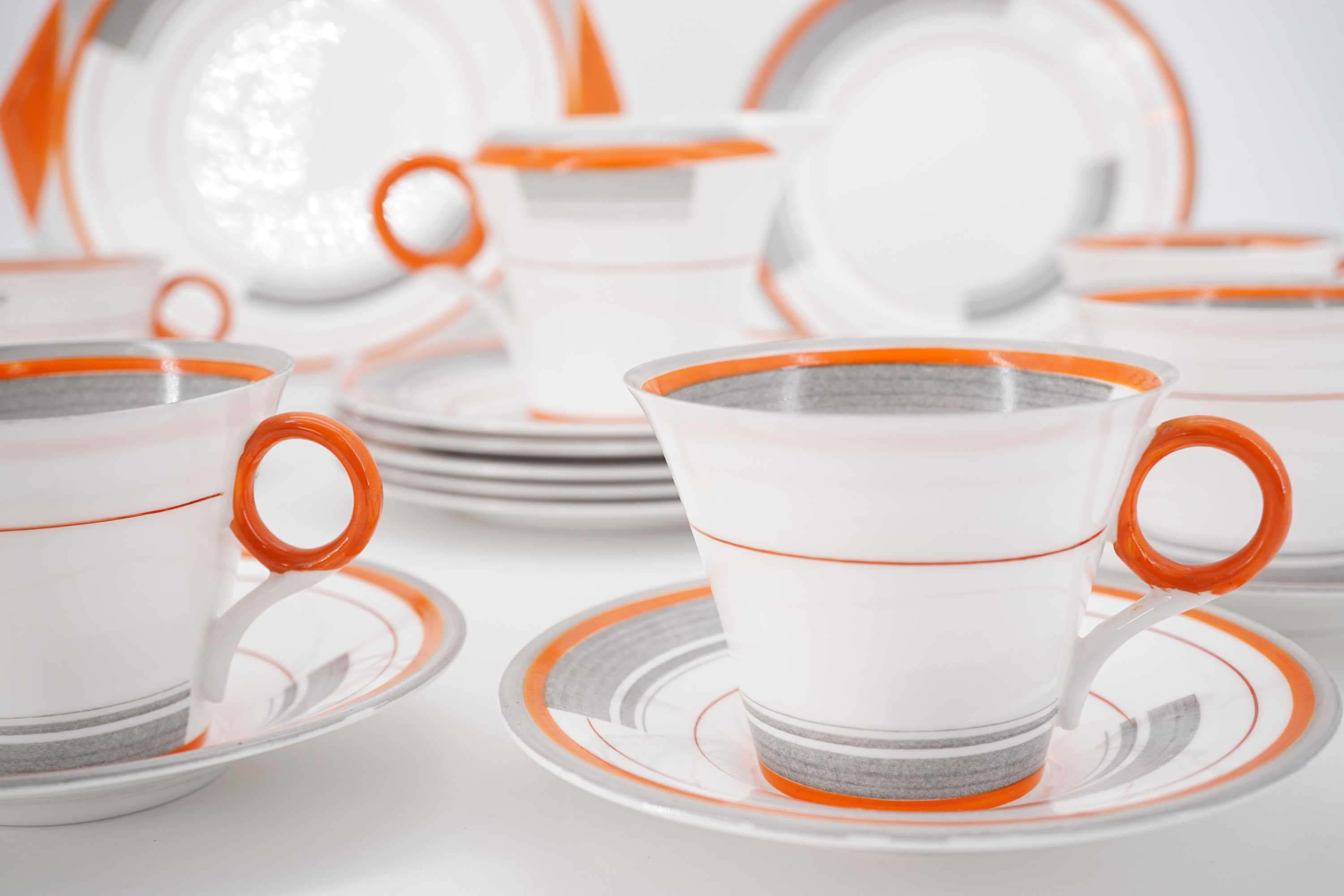 An early 1930s Art Deco Shelley tea set for six, comprising six tea cups and saucers, six cake - Image 3 of 4