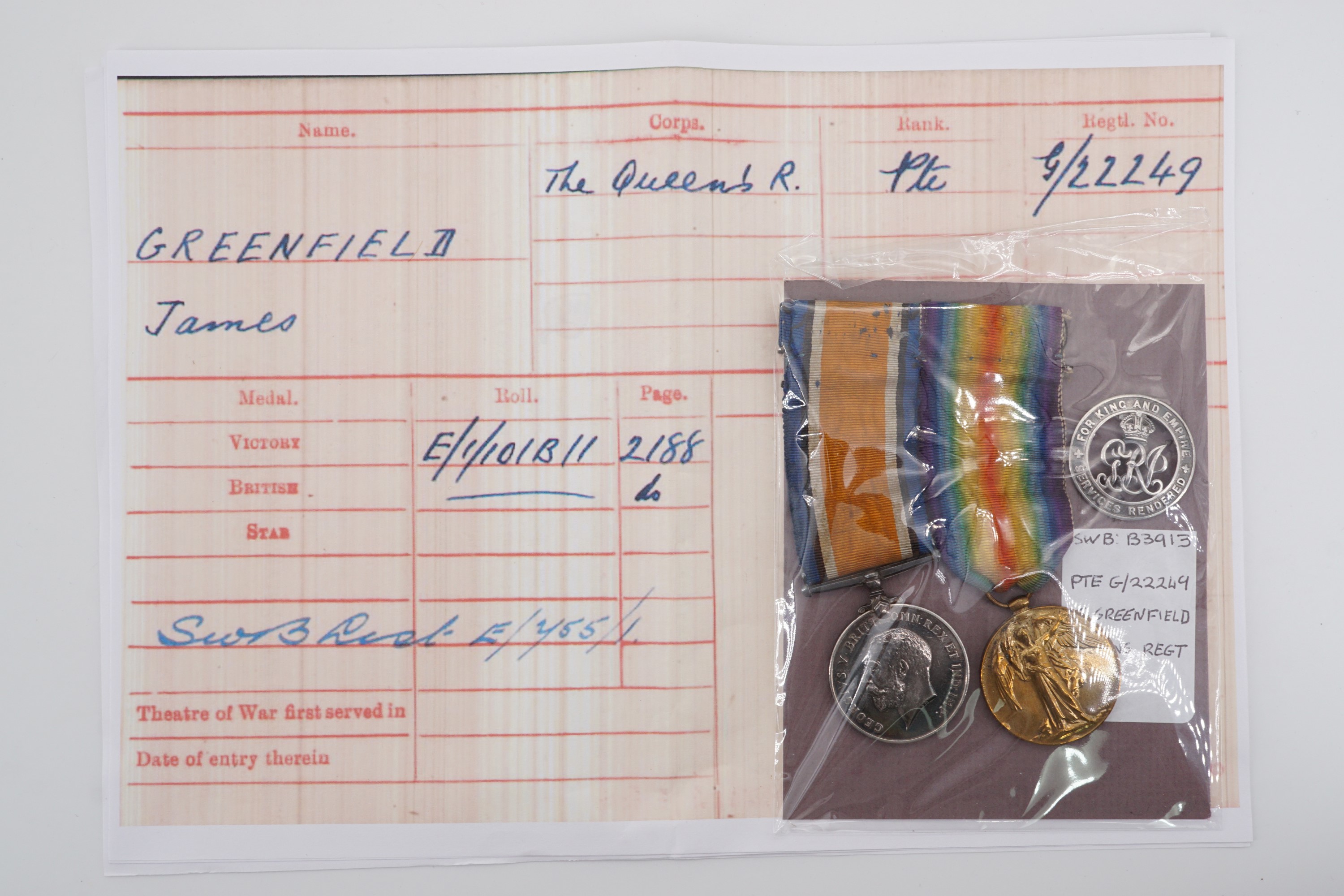 British War and Victory medals with Silver War Badge to G 22249 Pte J Greenfield, Queen's R, SWB