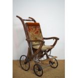 A late 19th / early 20th Century child's folding push chair