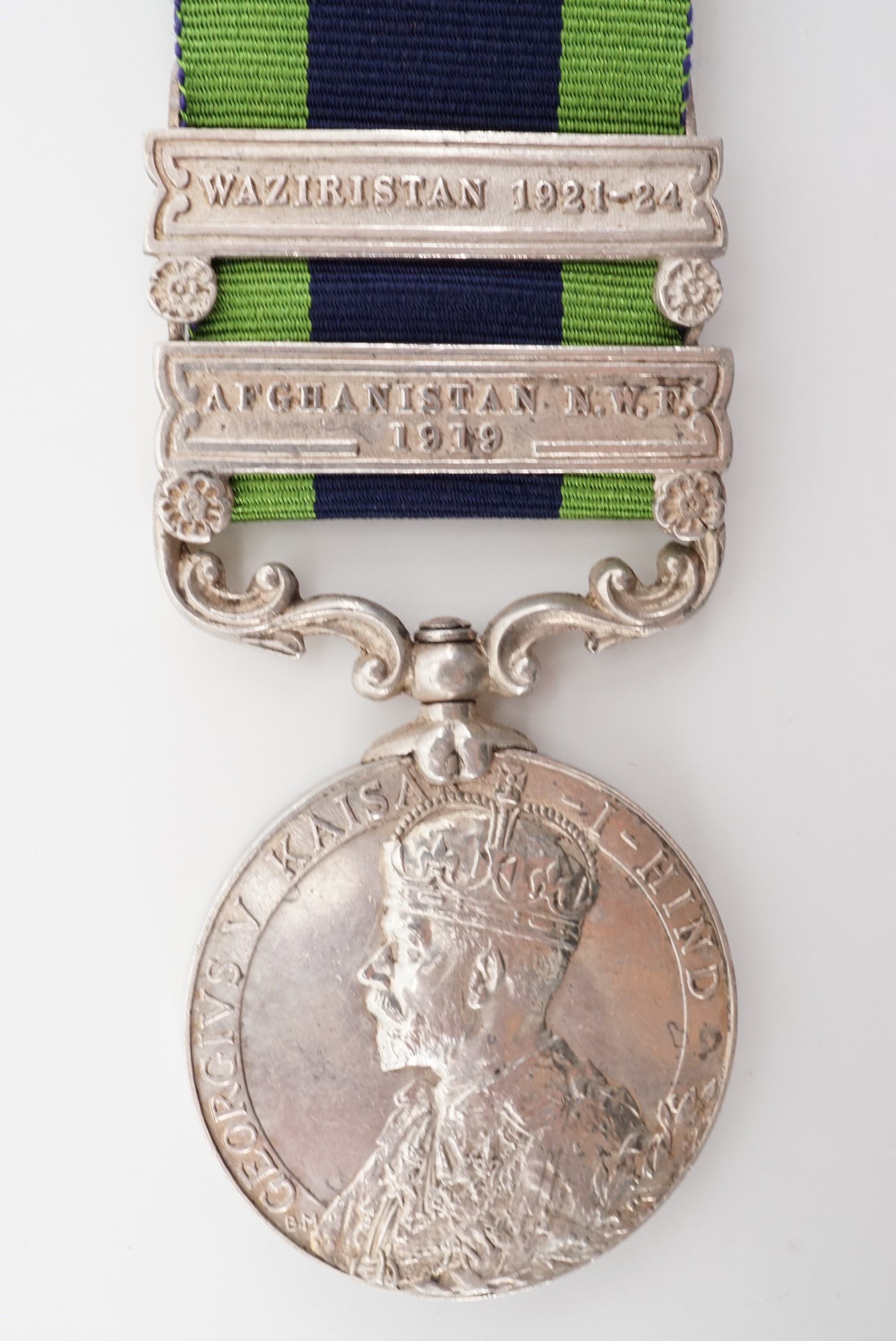 A George V India Service medal with Afghanistan NWF 1919 and Waziristan 1921-24 clasps to 404