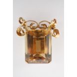 A vintage high carat yellow-metal and citrine brooch, the emerald cut citrine of approximately 24