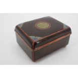 A Qing Chinese cloissone enamelled table cigarette box, the cover bearing a variant longevity symbol
