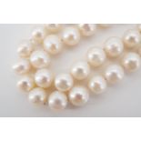 A heavy pearl rope necklace, each pearl approximately 1cm in diameter, 133g