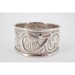 A Keswick School of Industrial Arts silver napkin ring, with repousse moulded and chased
