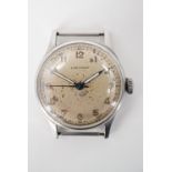 A 1940s military style Longines wrist watch, the movement numbered 7044440, press-on case back