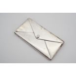 A George V silver novelty stamp / card case in the form of an envelope, with hinged cover, Adie &