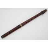 An antique nickel-mounted rosewood fife, 39 cm