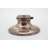 A George V silver capstan inkwell, Chester, 1920, loaded, with clear glass liner, 7.5 cm diameter