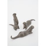 Three Royal Selangor pewter otters, shape No. 7726, 7727 and 7728, tallest 7 cm