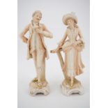 A pair of late 19th / early 20th Century Austrian porcelain figurines by Robert Hanke, modelled as a