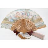 A Belle Epoque French painted hand fan retailed by Vagneur and Signol, Rue de la Paix, with sequin