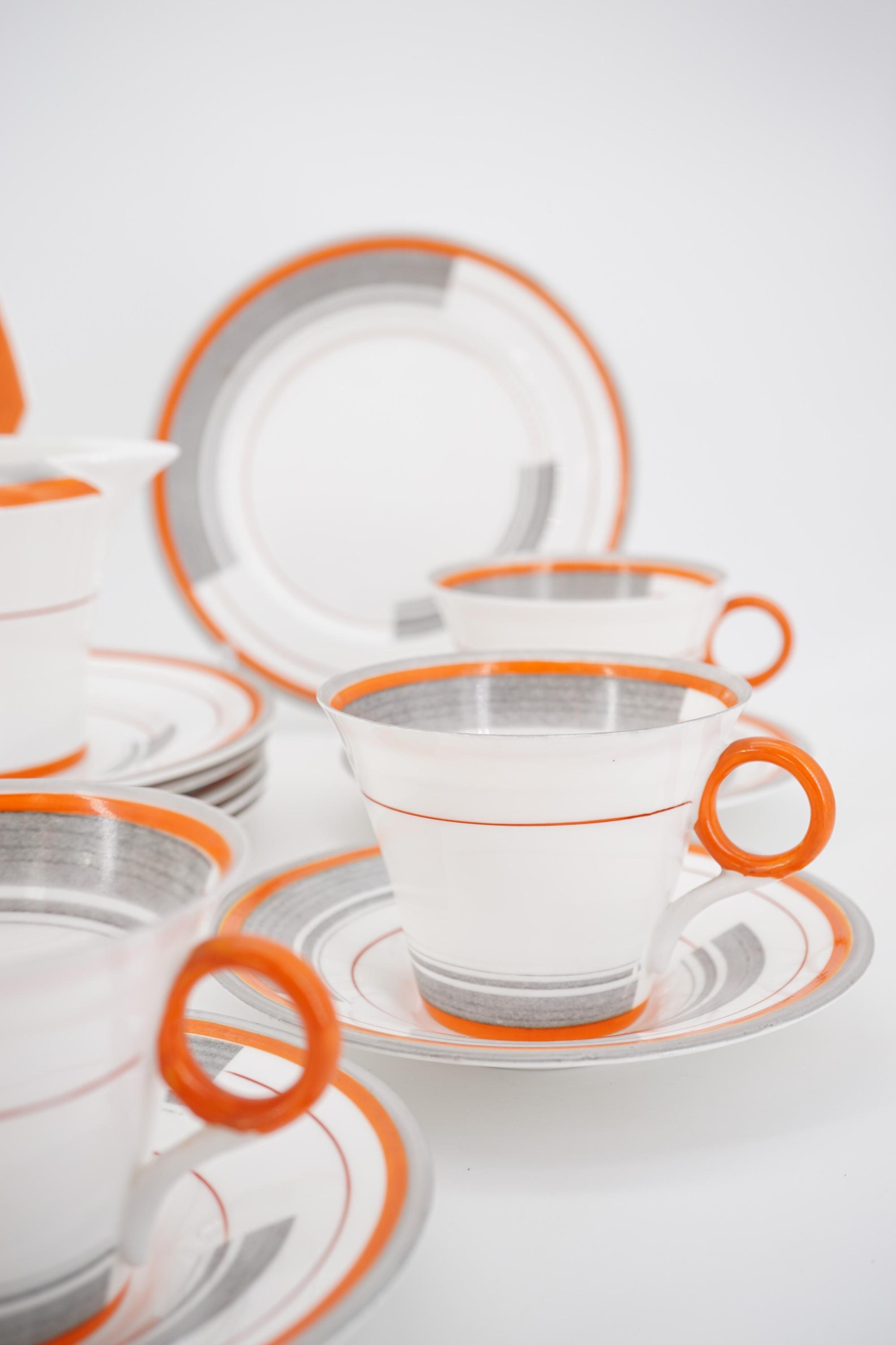 An early 1930s Art Deco Shelley tea set for six, comprising six tea cups and saucers, six cake