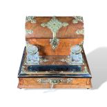 A Victorian brass-mounted and ebonised walnut ink standish cum stationary cabinet, comprising a