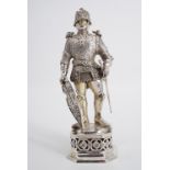 A pair of George V German silver and ivory statuettes modelled as knights probably by B Neresheimer,