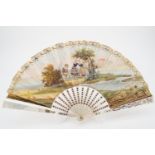 An early Victorian hand painted mother of pearl fan, the paper leaf depicting two young ladies