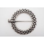 An Alexander Ritchie Iona Scottish silver penannular type brooch, of plaited design, with raised