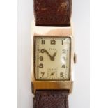 A gentleman's 1940s 9ct gold cased Frey tank wrist watch, having a Swiss 15 jewel movement, white