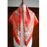 A vintage Hermes 'Jeux de Paille' pattern silk scarf designed by Francoise de la Perriere, in