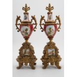 A pair of late 19th Century ormolu-mounted garniture urns, each oviform with flamboyant neo-