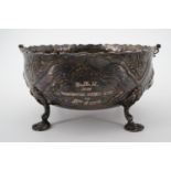A Victorian silver presentation bon bon basket, of circular section, bearing repousse moulded and