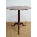 A George III tripod tea table with oval top, 70 cm x 46 cm