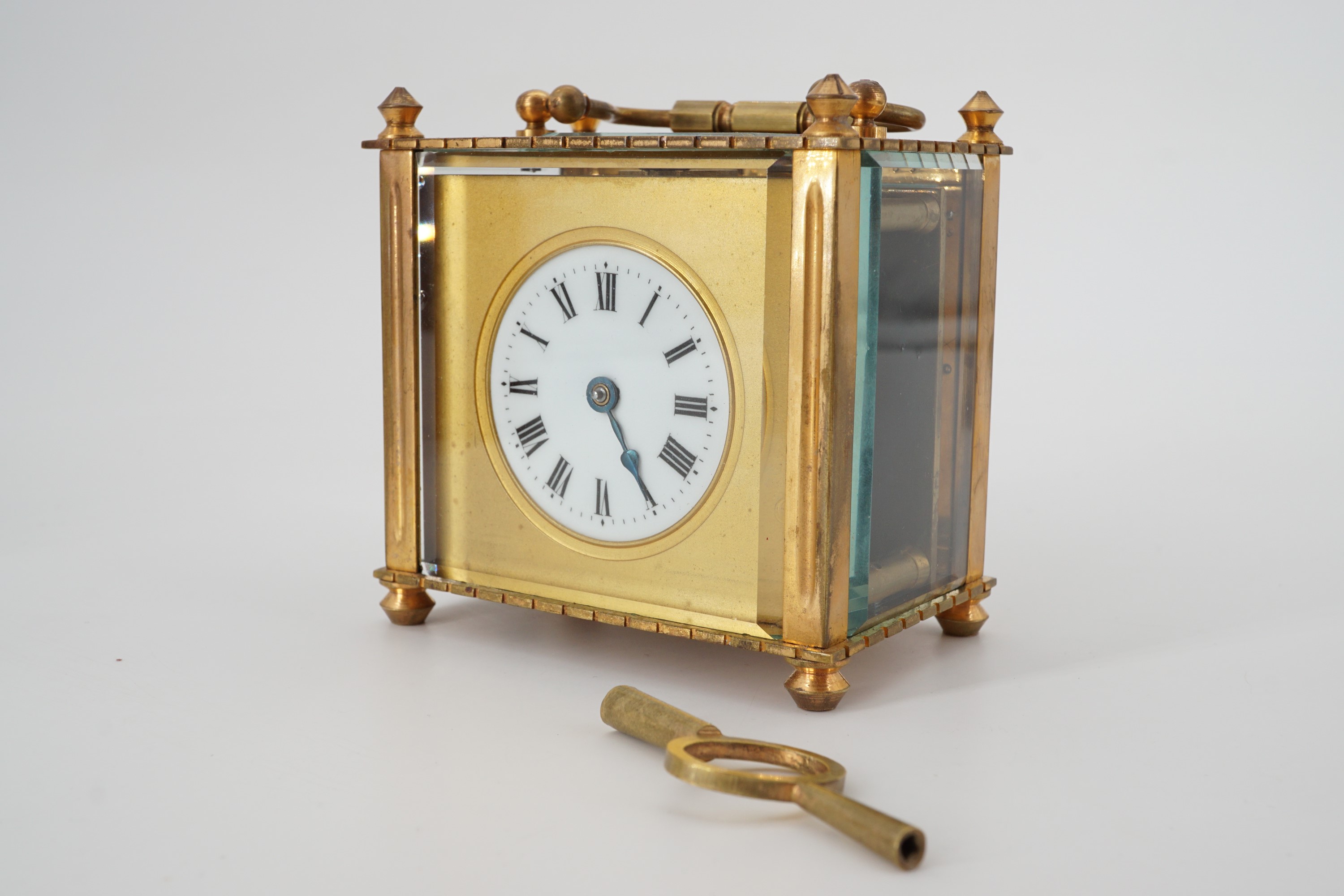A late 19th Century French carriage clock of squat proportions, in transit case, 9 cm high excluding - Image 2 of 3