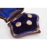 A Victorian cased set of yellow metal shirt studs, with foliate engraved decoration, 2g