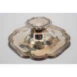 A George V silver capstan inkwell, with cusped and reeded borders, marks rubbed, Sheffield, 1927,