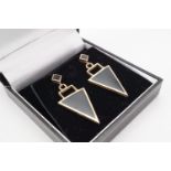 A contemporary pair of 9ct gold and onyx ear pendants, of geometric design, 4 cm drop, 5.8g