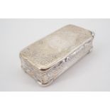 A Victorian silver snuff box, of rounded rectangular section, with engraved foliate decoration,