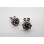 A pair of 9ct white gold, sapphire and diamond flower head cluster ear studs, 1.5g