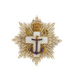 Cruz al mérito naval con distintivo blanco en plata y esmalte, 1938-1975. Diám.: 6 cm.