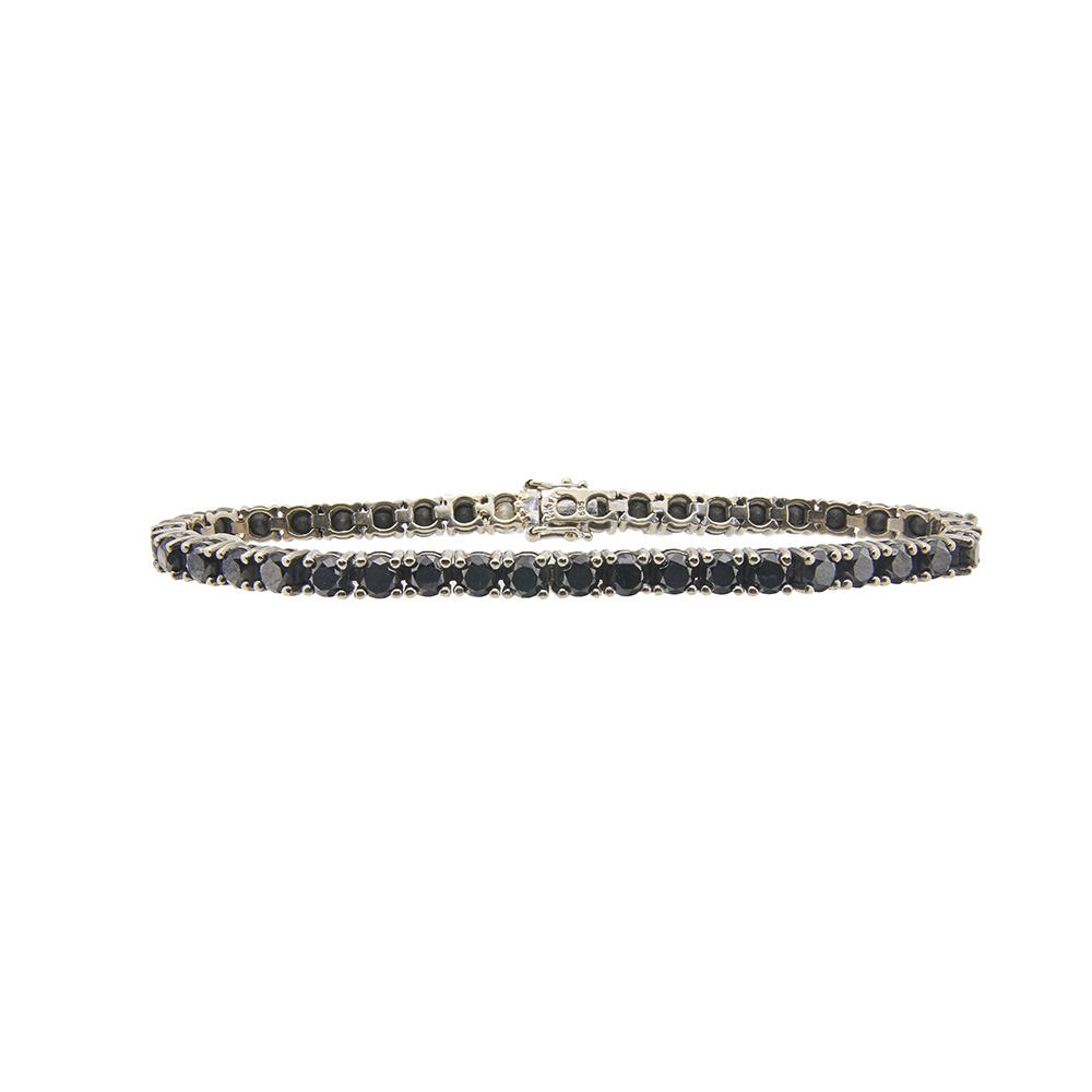 Pulsera rivière en oro blanco con diamantes negros talla brillante y dos blancos en el cierre