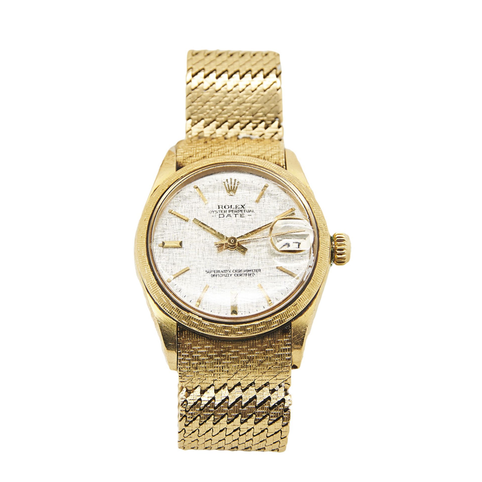 Reloj Rolex Oyster Perpetual Date de pulsera para cadete. En oro. Esfera argenté con numeración a