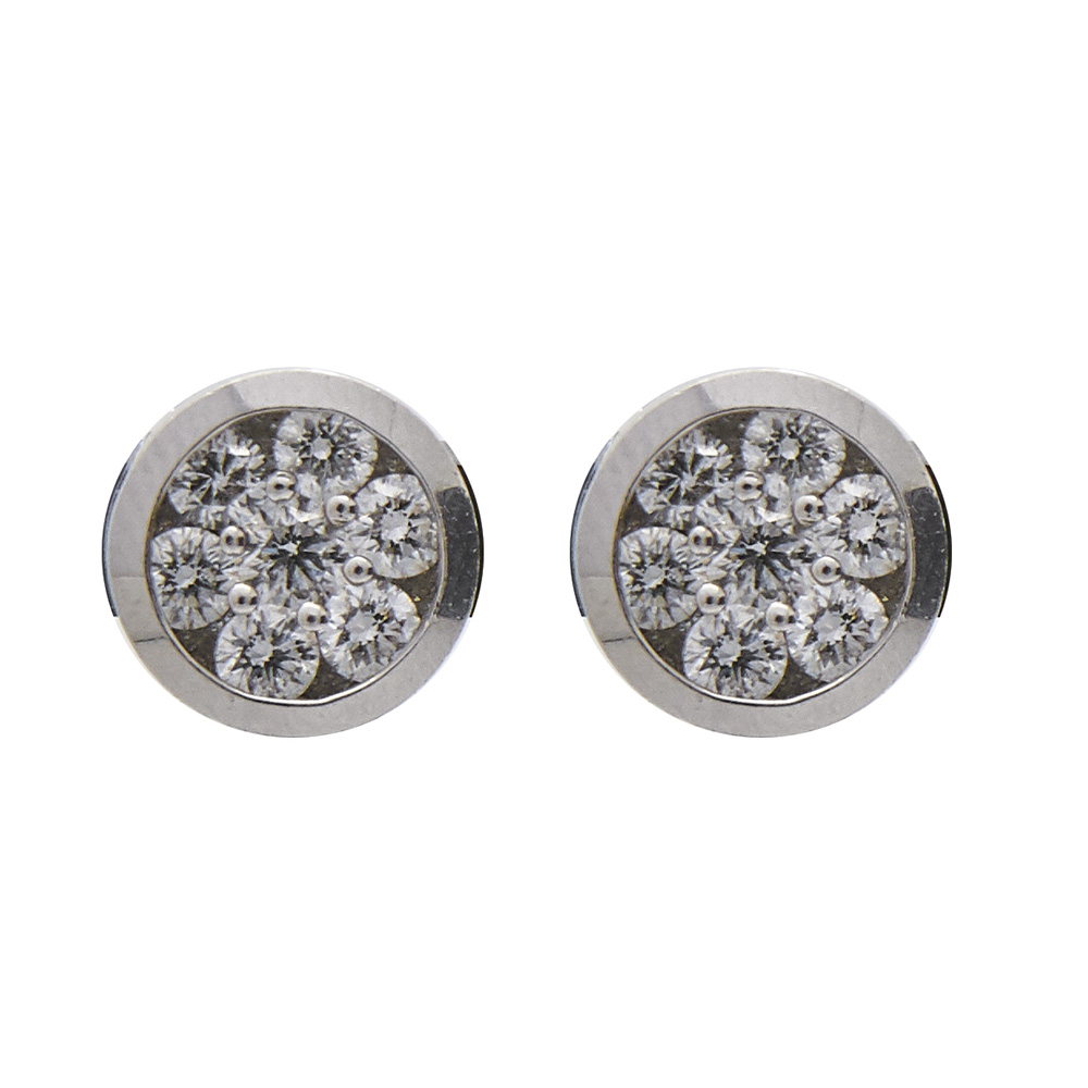 Pendientes diseño circular en oro blanco con rosetón central de diamantes talla brillante. Peso