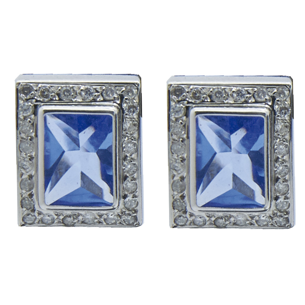 Pendientes en oro blanco con símil de topacio azul talla rectangular orlado por diamantes talla