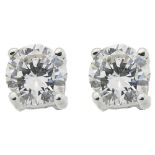 Pendientes en oro blanco con diamante talla brillante engastado en garras. Peso diamantes: 0,50