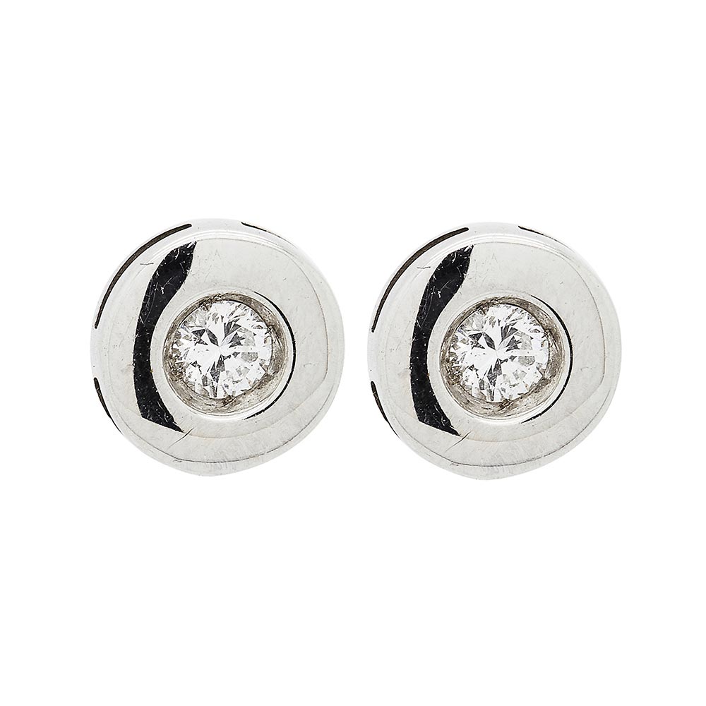 Pendientes en oro blanco con diamante talla brillante engastado en chatón. Peso diamantes: 0,30