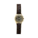 Reloj de pulsera para caballero, c.1940. En oro y correa de piel no original. Esfera negra con